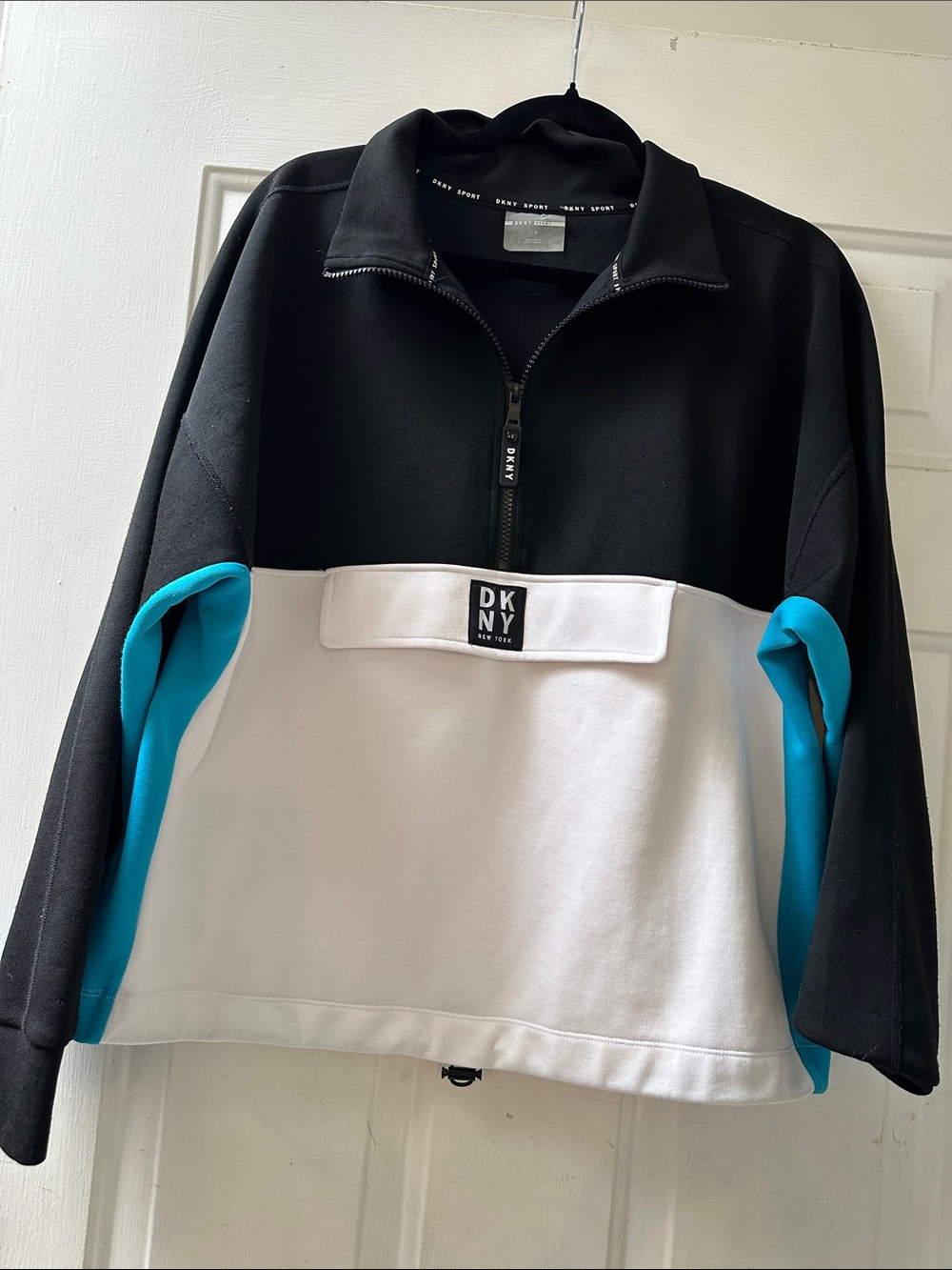 DKNY women’s Black, White & Teal Colorblock Zip Pullover Sweater